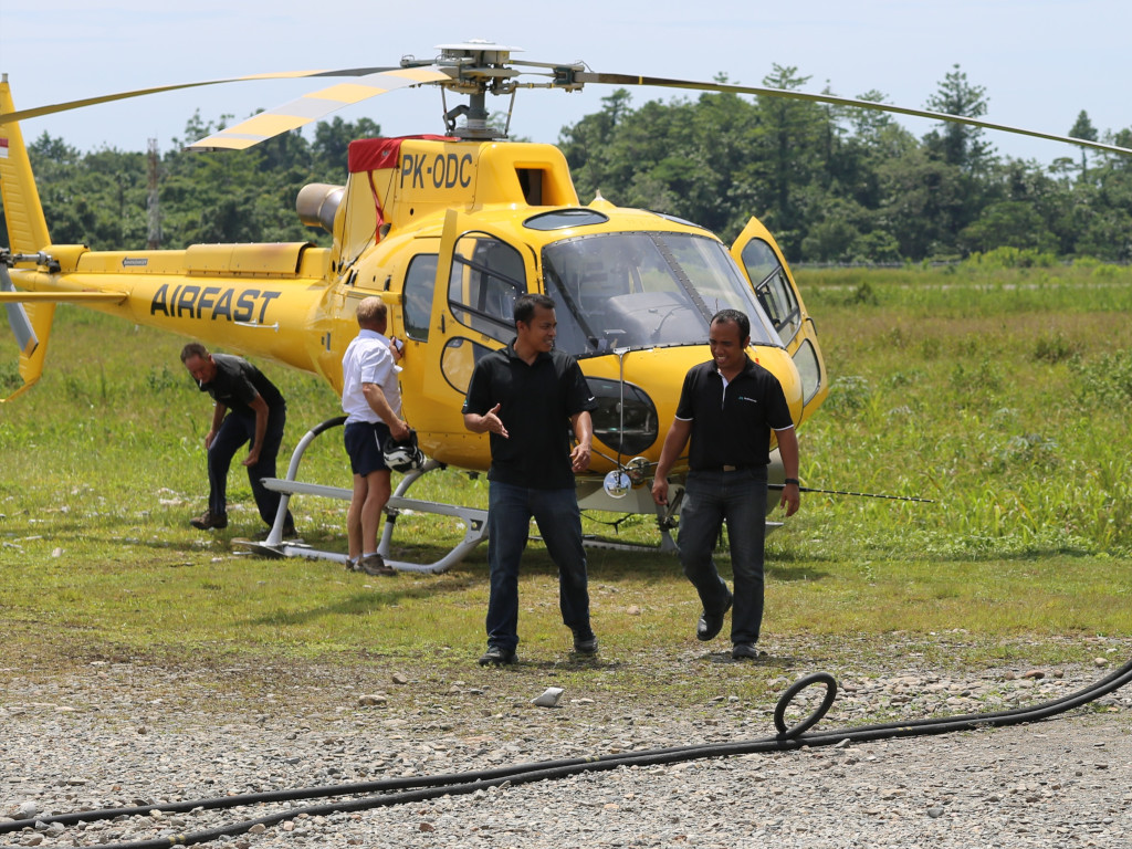 With my colleague, Imam, just after LiDAR pod installation at Timika Airport, West Papua, Indonesia (2014)