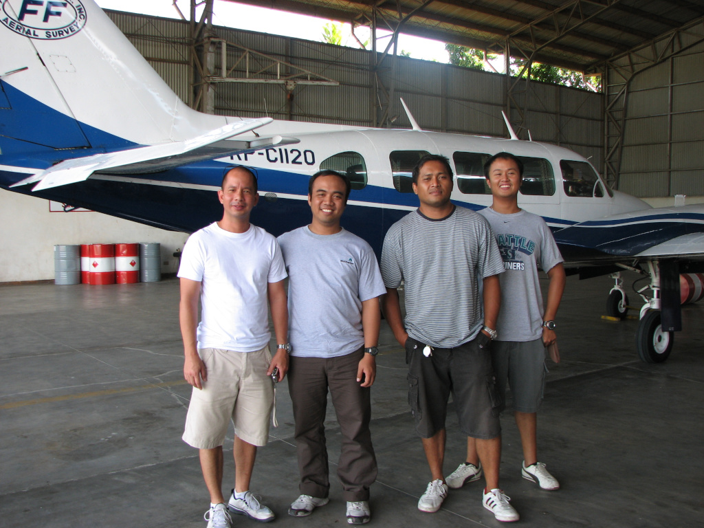 Posing with the air crew of FF Cruz's Piper PA-31 Navajo, at the conclusion of a LiDAR survey, Davao, Phillippines (2011)